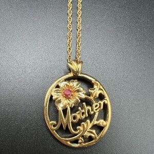 Avon gold tone necklace with “Mother” pendant